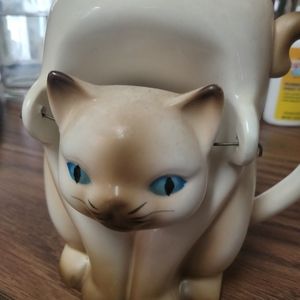 Sarsaparilla cat mug with bobble head.
